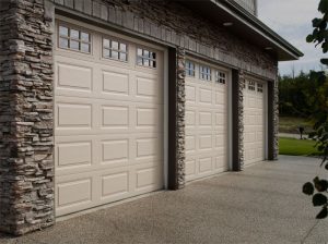 ThermoCraft sandstone garage door with stockton windows