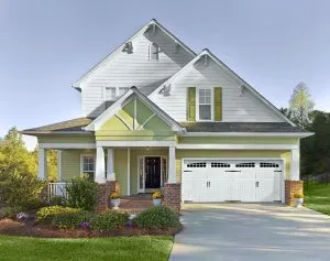 Hillcrest long beadboard garage door with moonlite windows